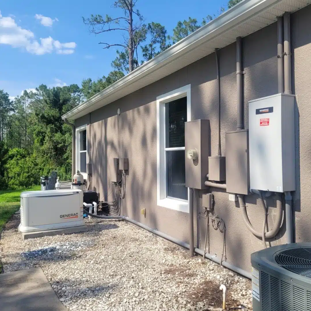Generator installation and electrical components on a residential exterior wall in Kansas City, highlighting reliable power solutions by Current Solutions Electric.